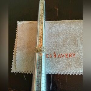 Retired James Avery Fleur De Lis wide band. Approximately 9.5